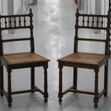 Pair of wooden caned chairs