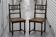 Pair of wooden caned chairs