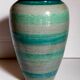 Ceramic vase scarified with gray-blue enamel