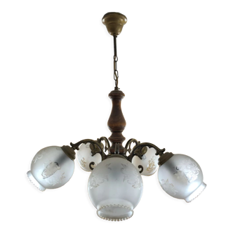Glass and wood chandelier and brass