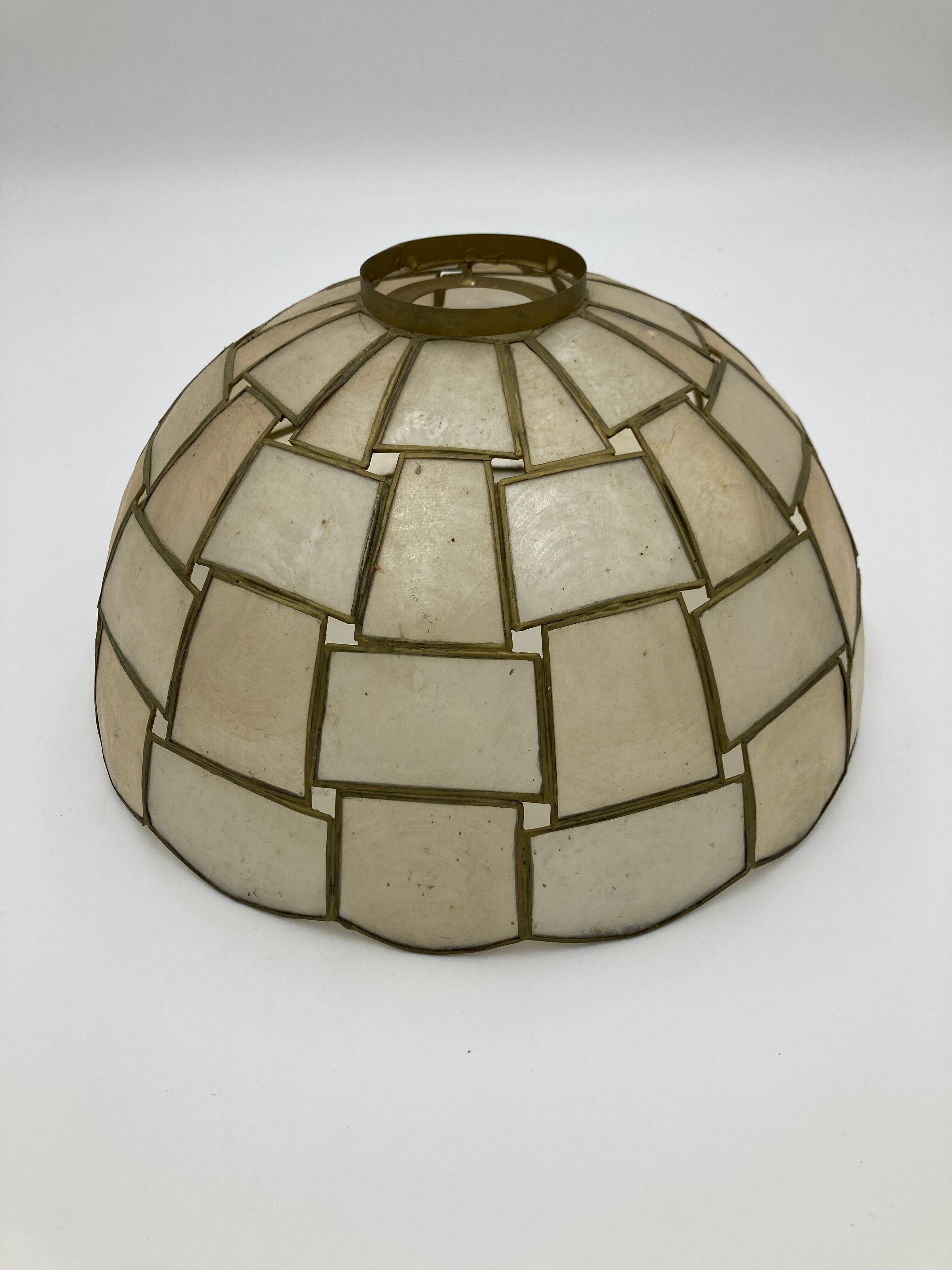 Suspension in geometric mother-of-pearl