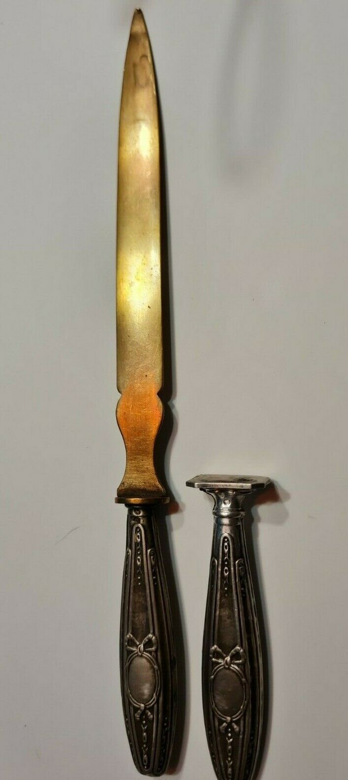 Paper cut with a stamp handle punches boar heads
