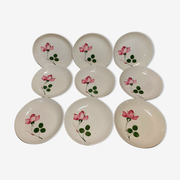 9 hollow plates caps in faience with decor of a rosebud