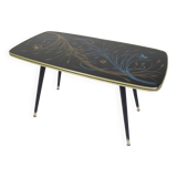 Vintage coffee table with glass top and angled legs, 1950s