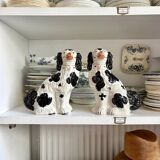Pair of black Cavalier King Charles dogs in Staffordshire pottery, 19th century.