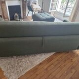 Green fabric sofa and its footrest/ottoman