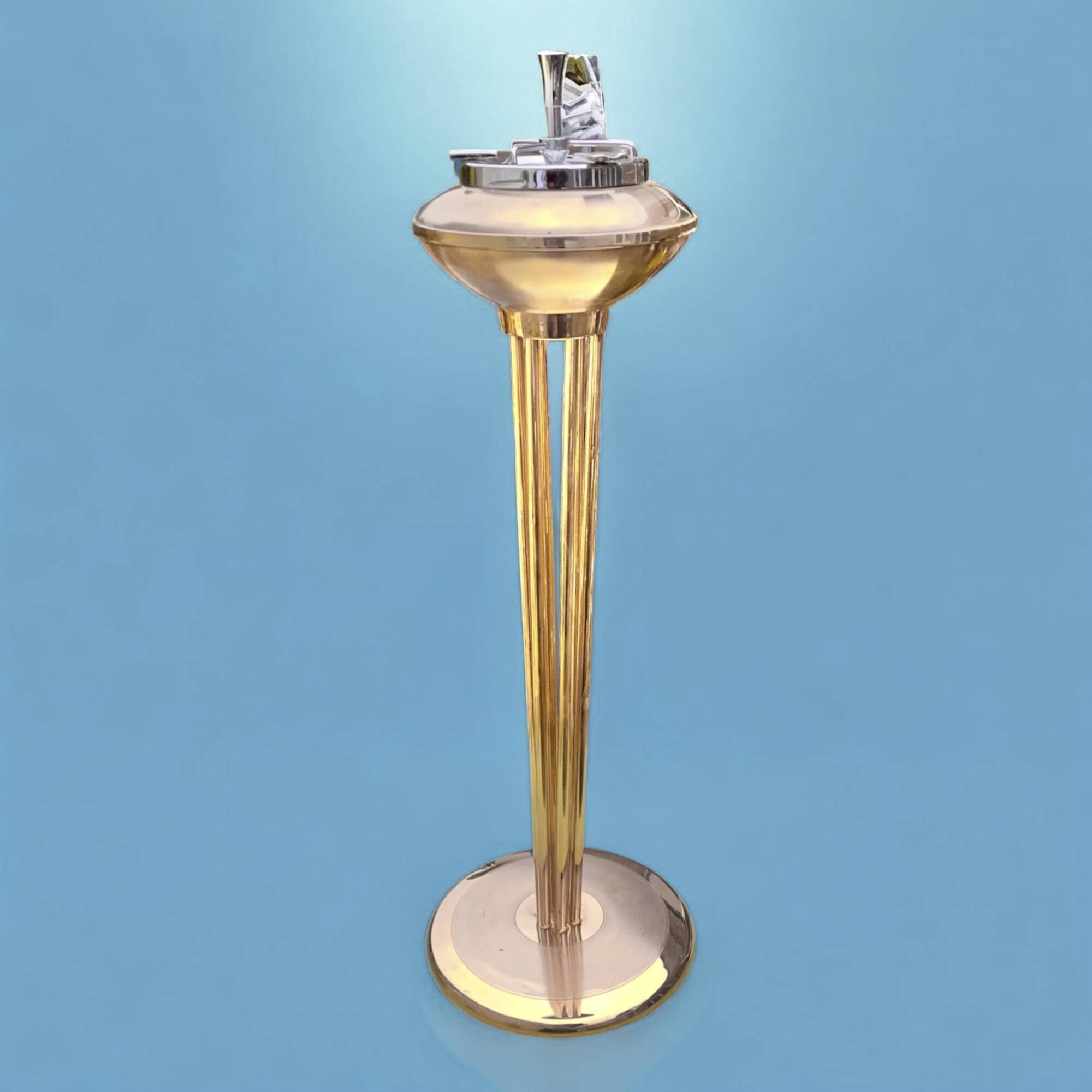 Old brass and chrome-plated metal ashtray on stand