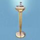 Old brass and chrome-plated metal ashtray on stand
