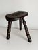 Restored dark wood tripod stool, bobbin leg, elegant furniture.