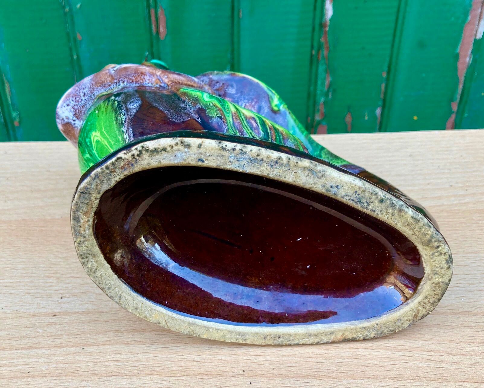 Glazed ceramic pitcher, fish
