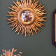 Vintage sun mirror with witch's eye mirror