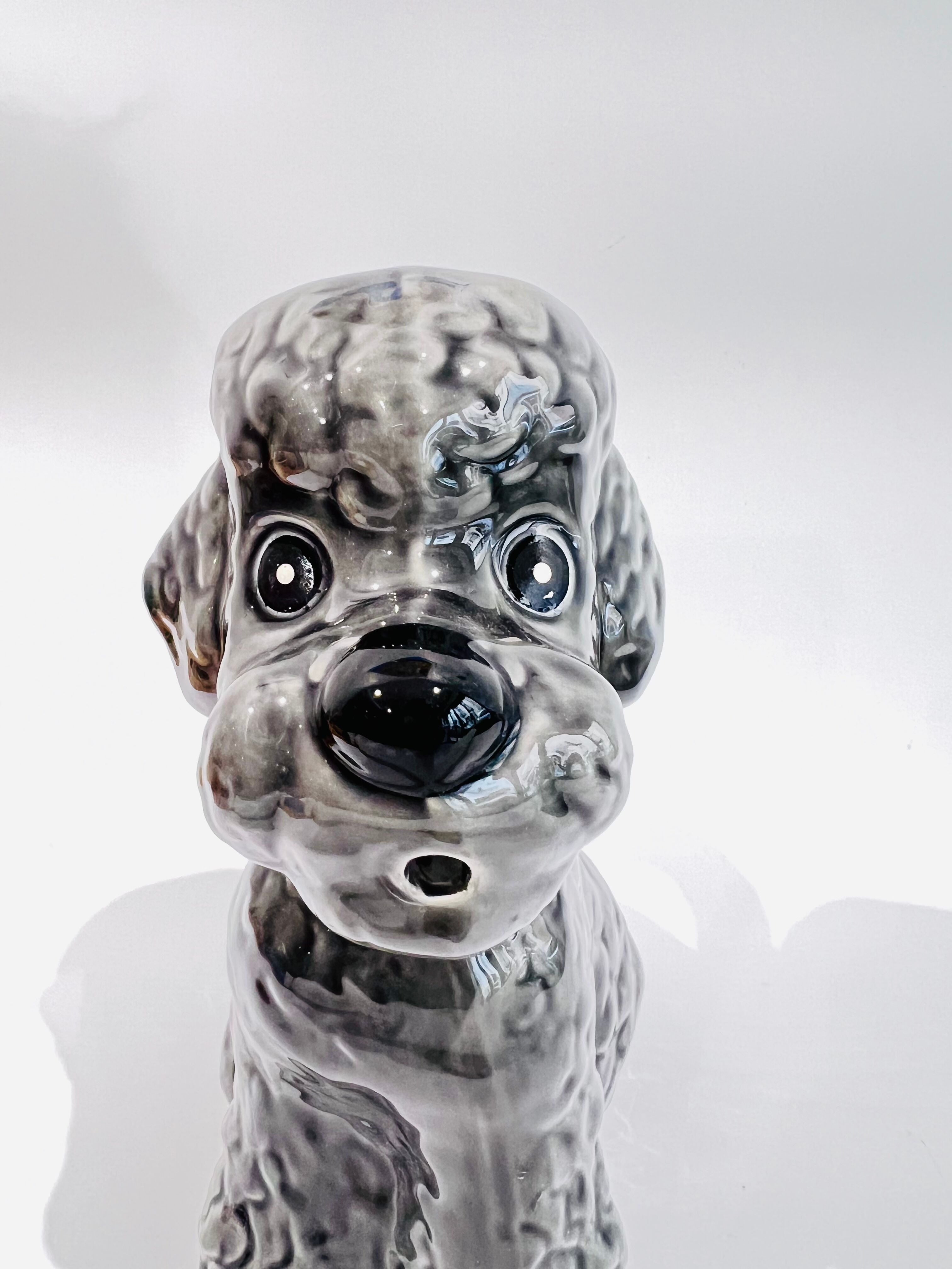 Pitcher in grey poodle slip