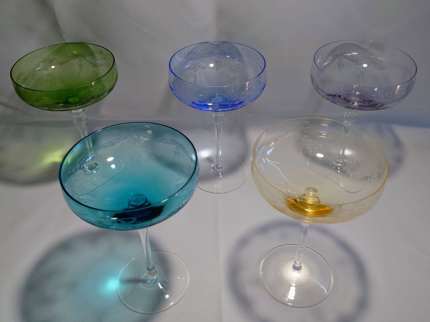 5 colored champagne glasses
