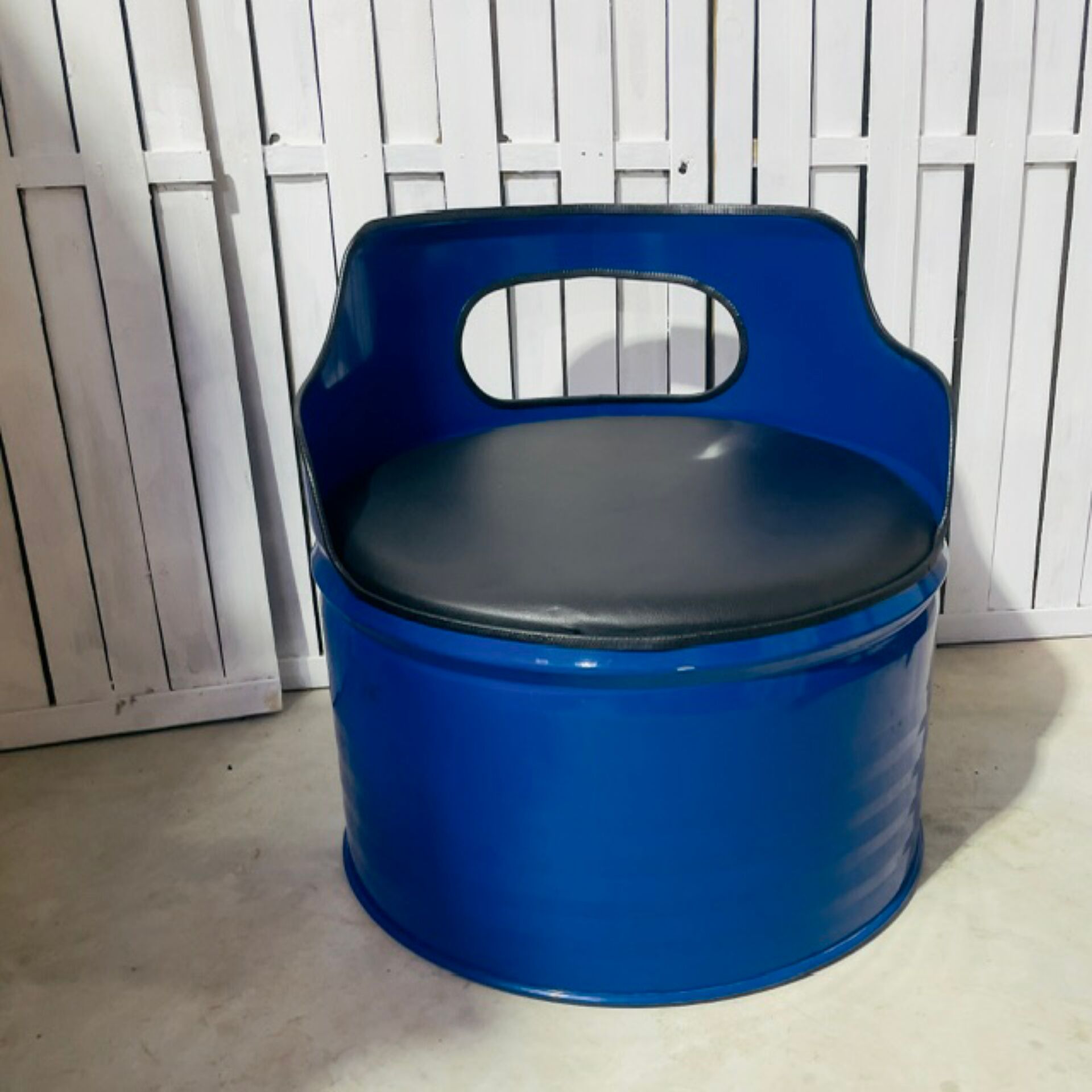Vintage blue stool, comfortable and full of character.