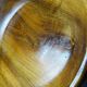 Teak or acacia wooden bowl, vintage craftsmanship from the 70s to 2000s.