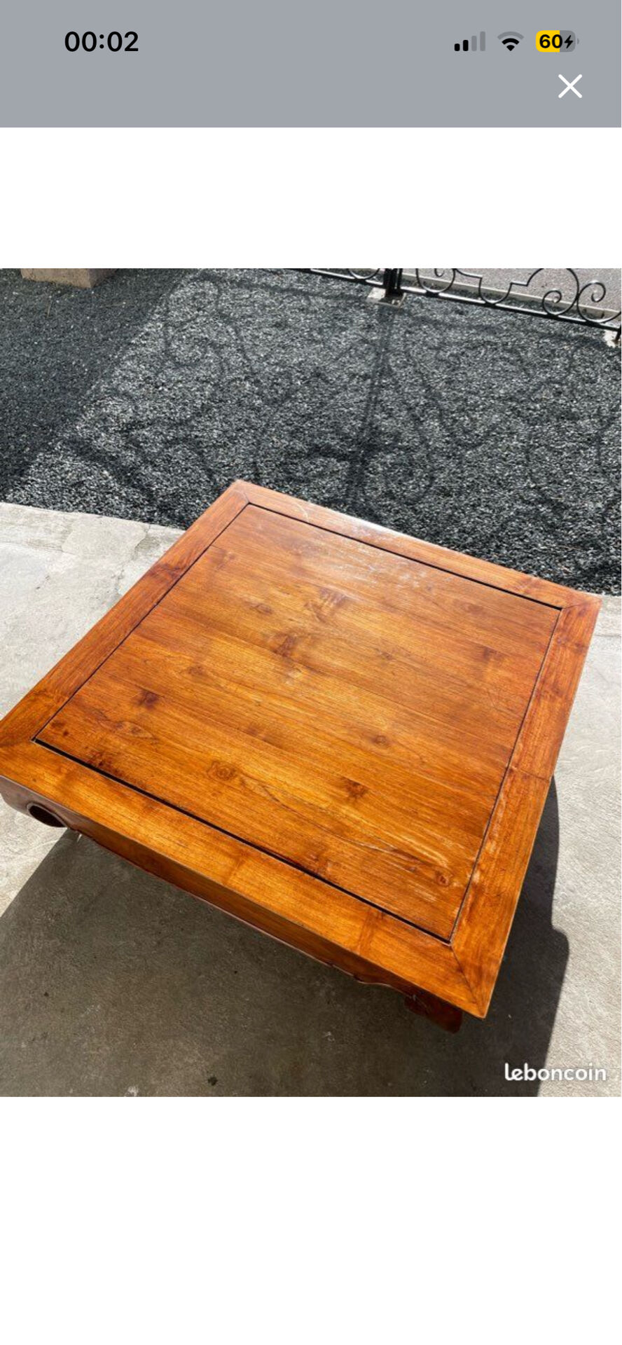 Teak coffee table in opium style.