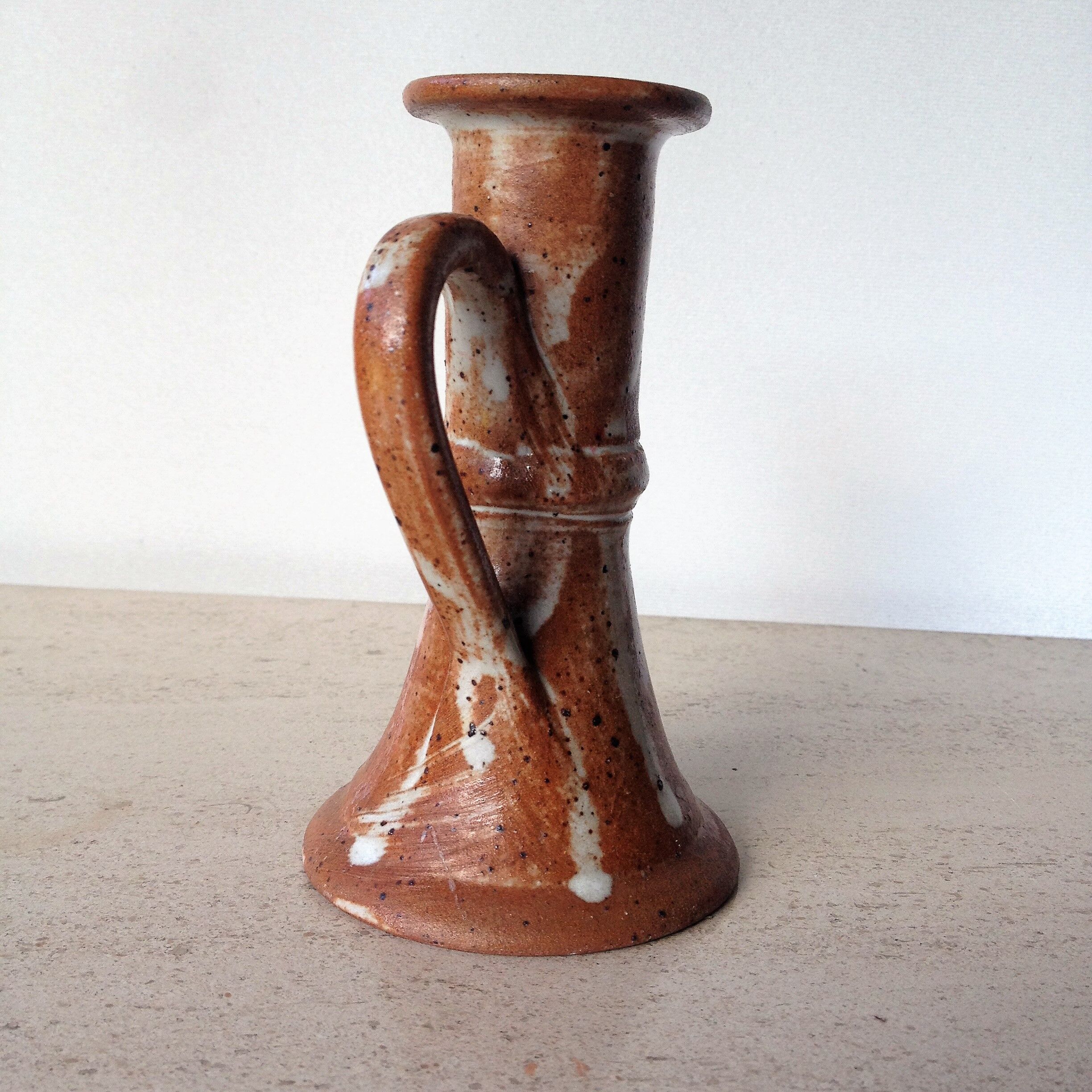 Pair of candlesticks in glazed stoneware