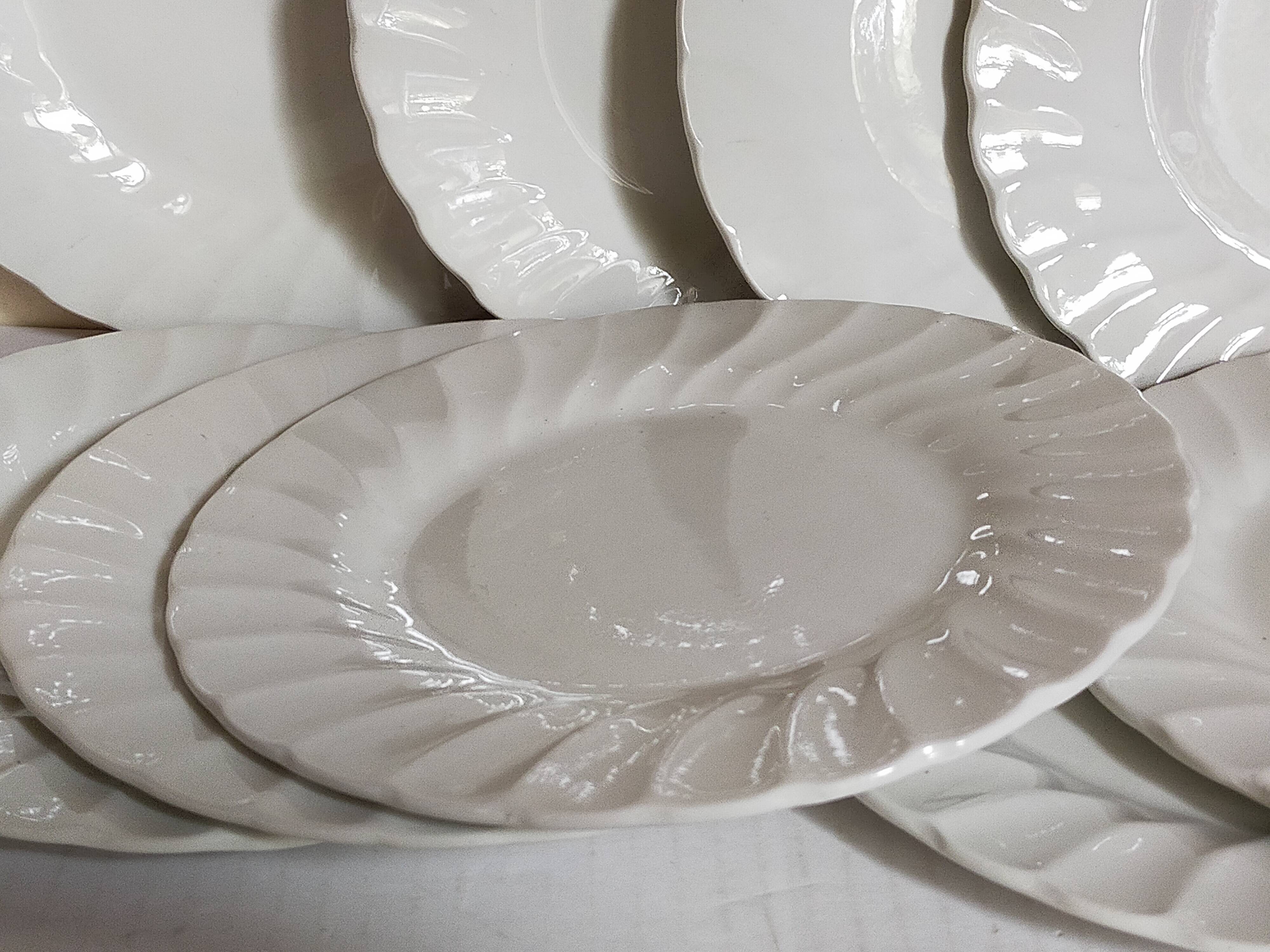 Nine fine English porcelain sweet plates