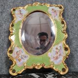 Porcelain mirror with cherub decorations circa 1900