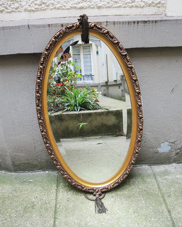 Beveled oval mirror