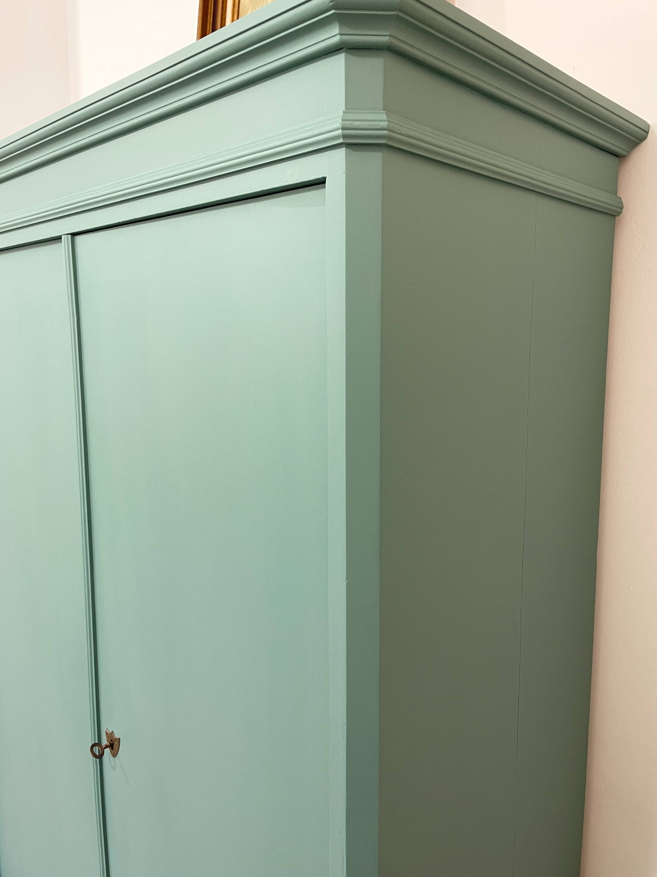 Antique solid pine wardrobe, reimagined in Celadon Green.