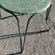 Garden table, two armchairs and a metal chair