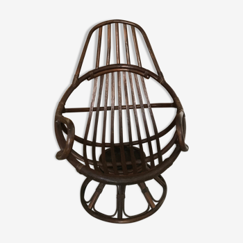 Swivel rattan armchair