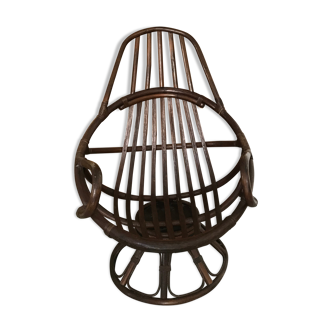 Swivel rattan armchair