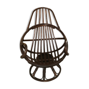 Fauteuil rotin pivotant