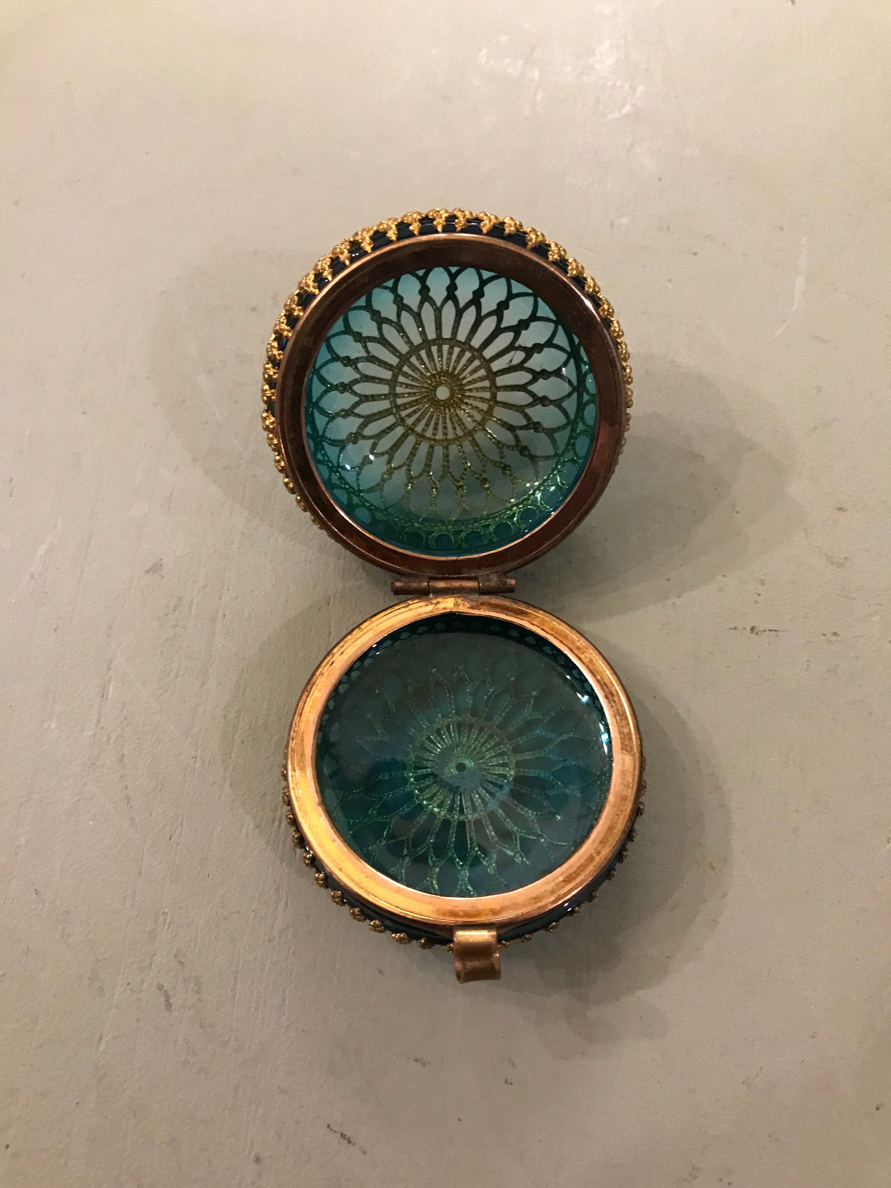 Old pill box made of golden thread