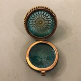 Old pill box made of golden thread