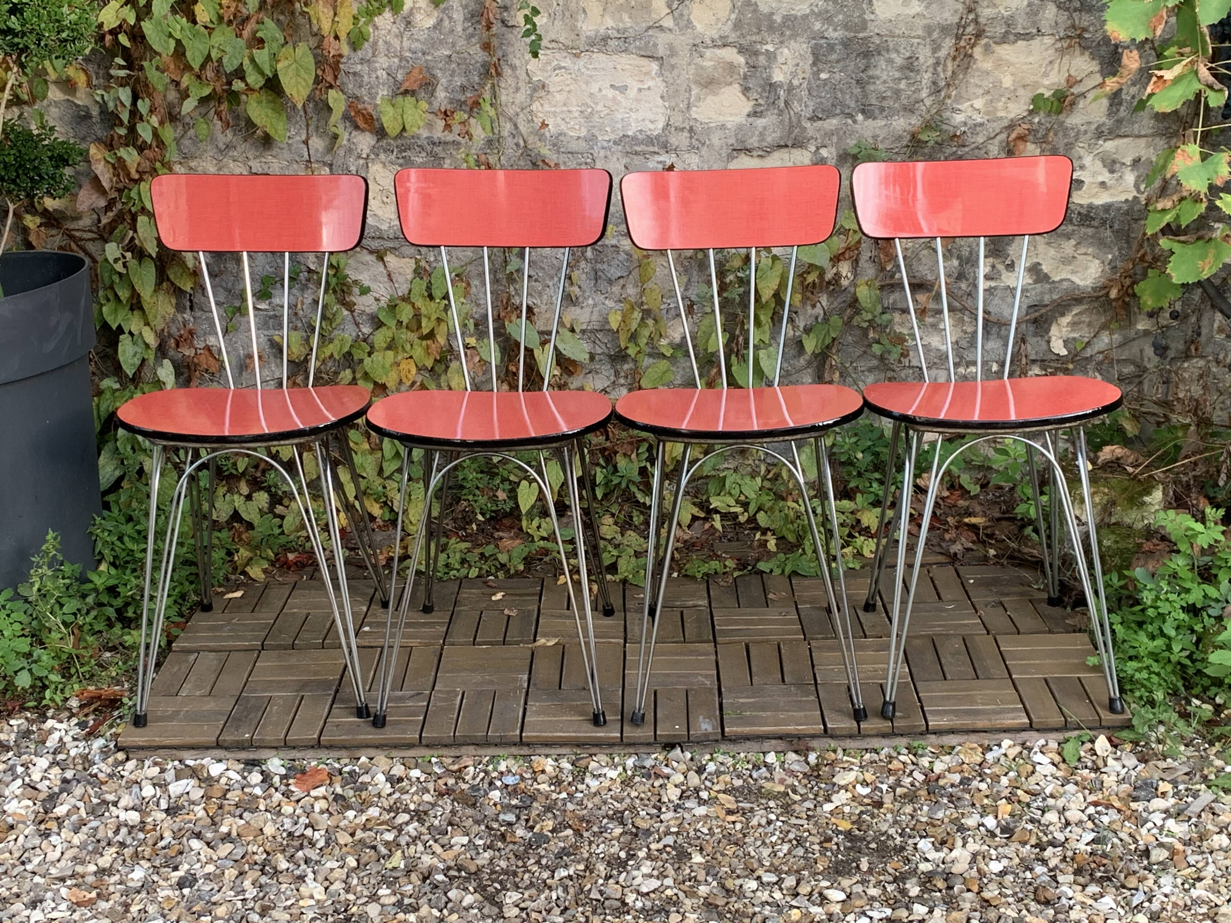 4 red Formica chairs with Eiffel legs, 1950s
