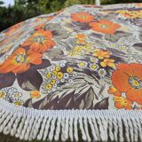 Vintage parasol in brown orange flower canvas with fringes on the edge