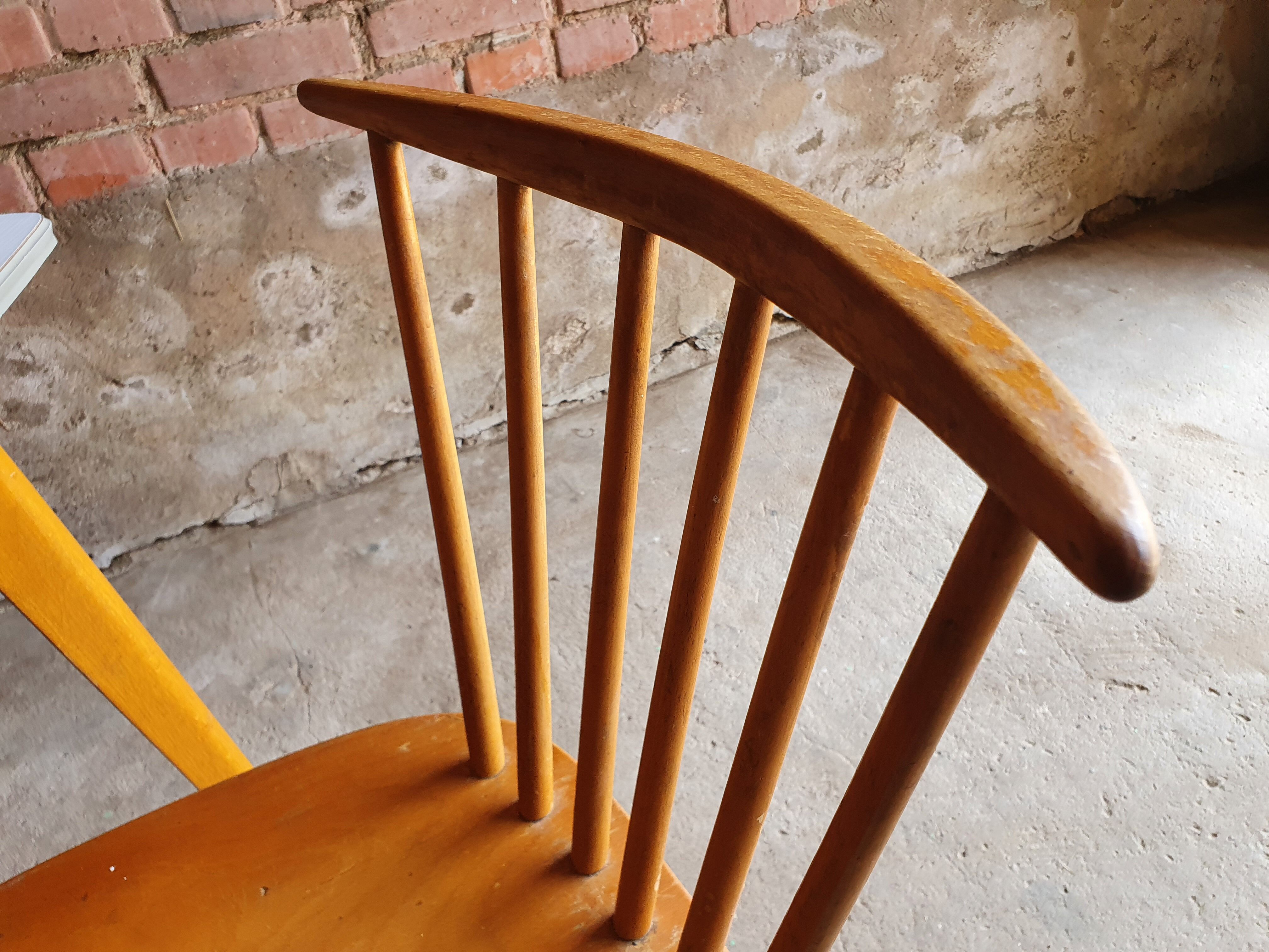 Together two Scandinavian chairs and its wooden and formica table