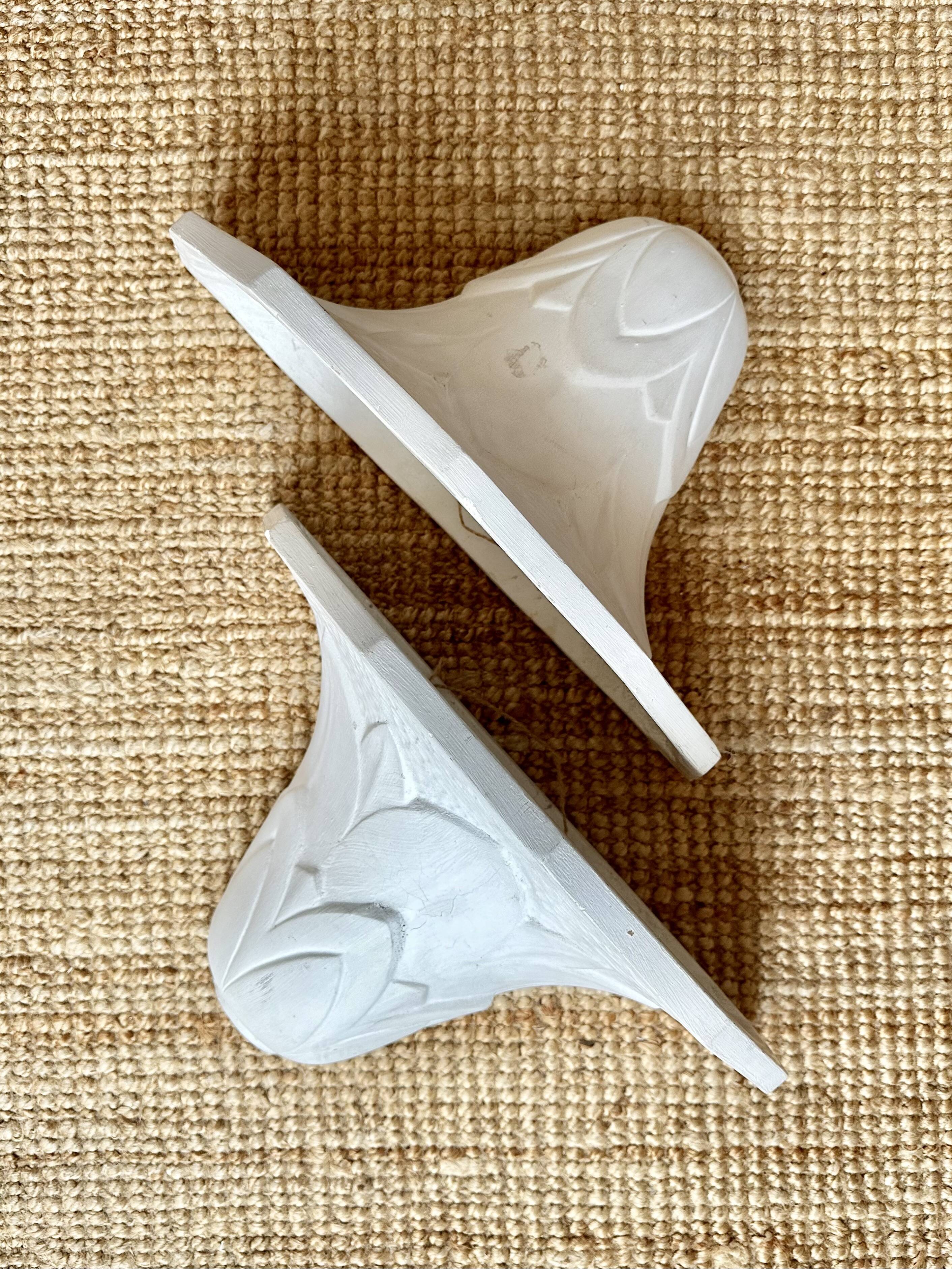 Pair of plaster wall sconces, palmette decoration, 20th century