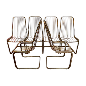 chaises en metal doré