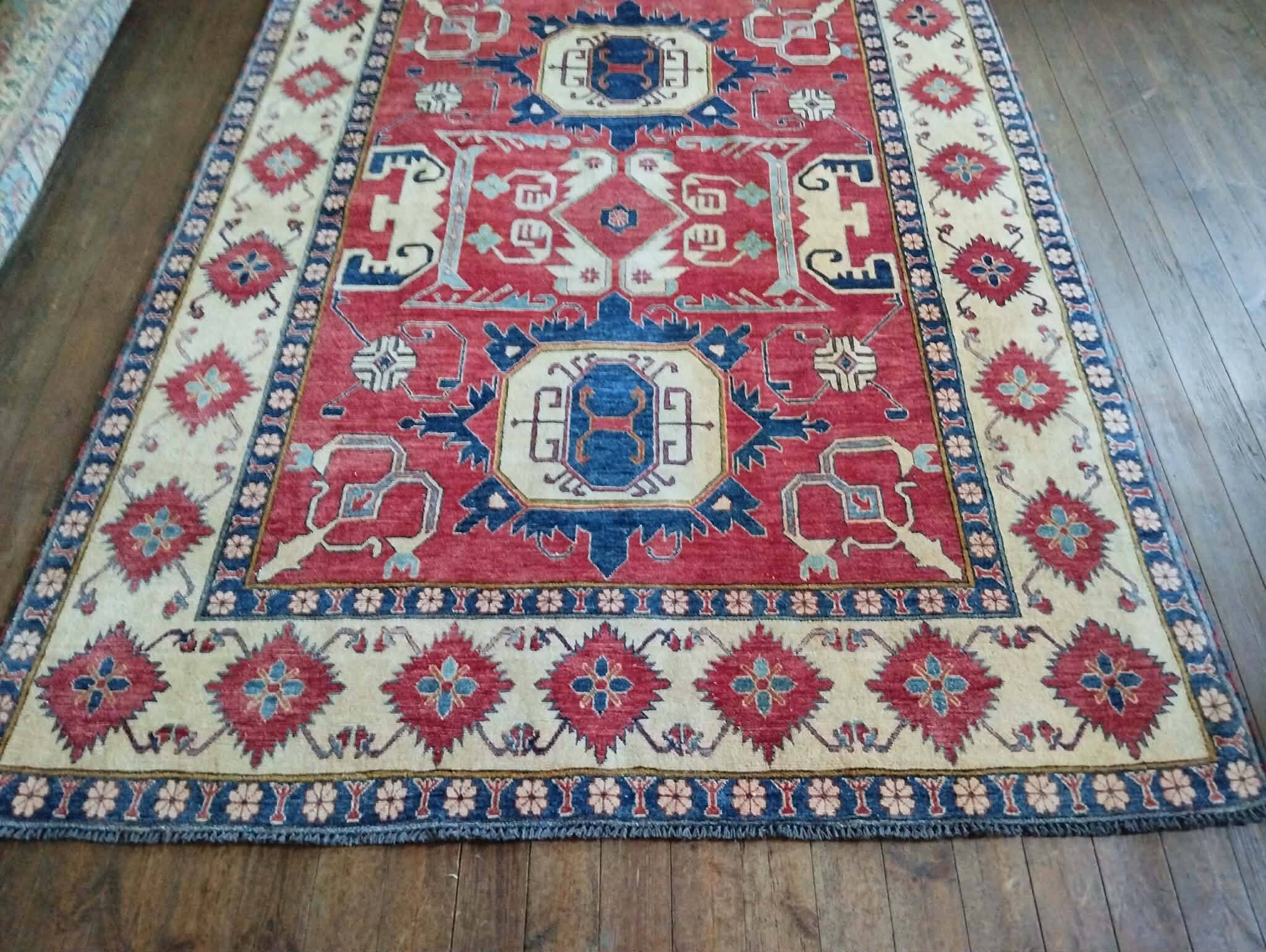 Handmade Pakistani Kazak rug 303x225cm