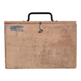 Small trunk in old wooden chest