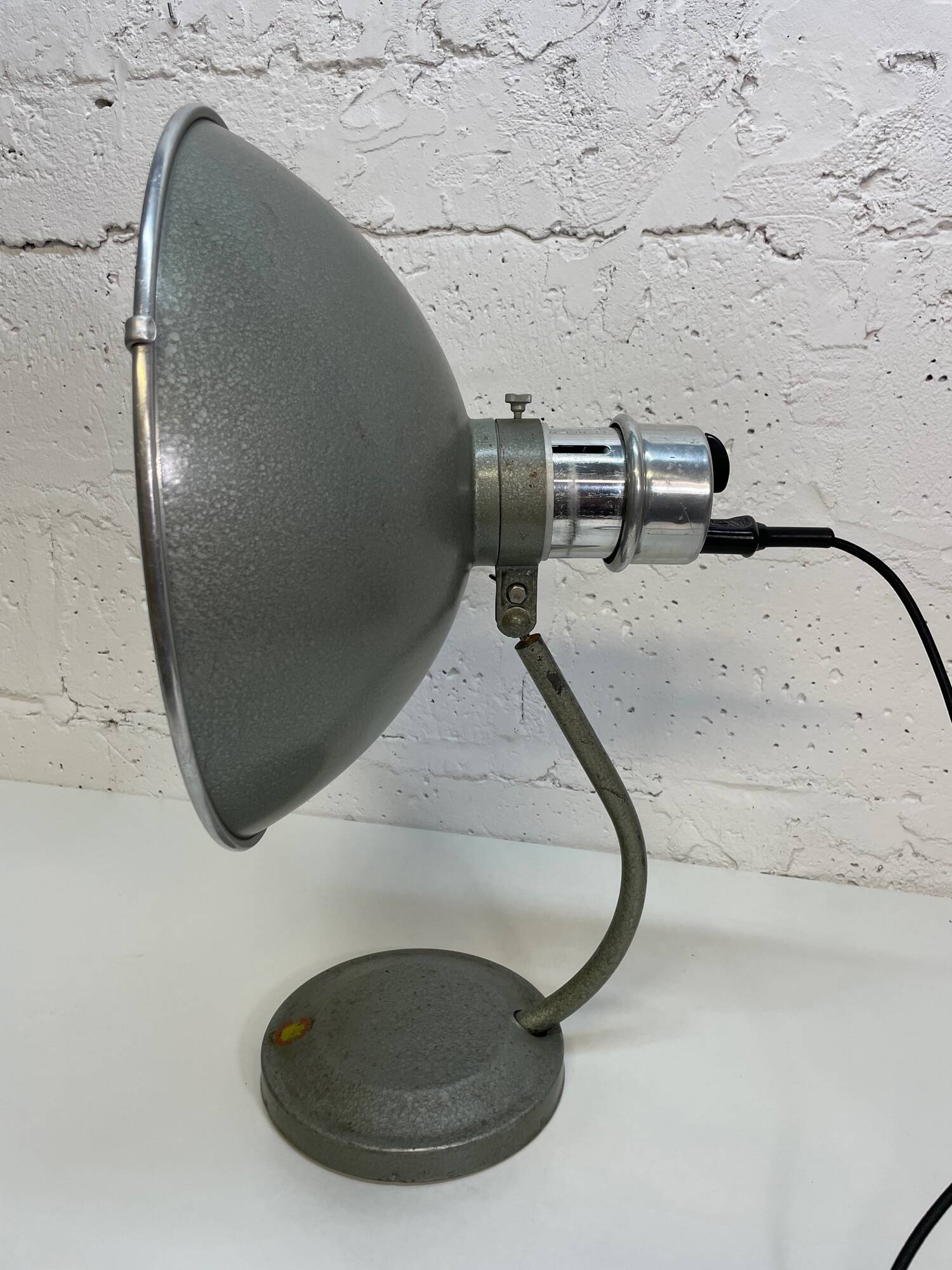 Industrial, medical table lamp.