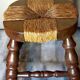 Low vintage regional stool in solid wood with straw top