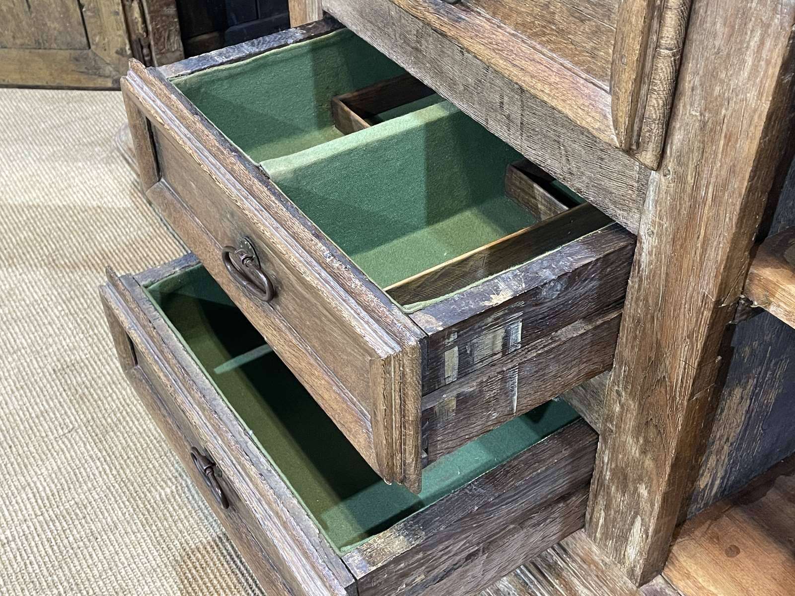 18th-century oak enfilade with a marble-effect painted top.
