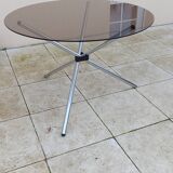 Vintage 70s table with glass and chrome legs.