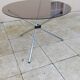 Vintage 70s table with glass and chrome legs.