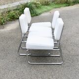 4 chauffeuses formant canapé modulable. acier, simili-cuir, années 70