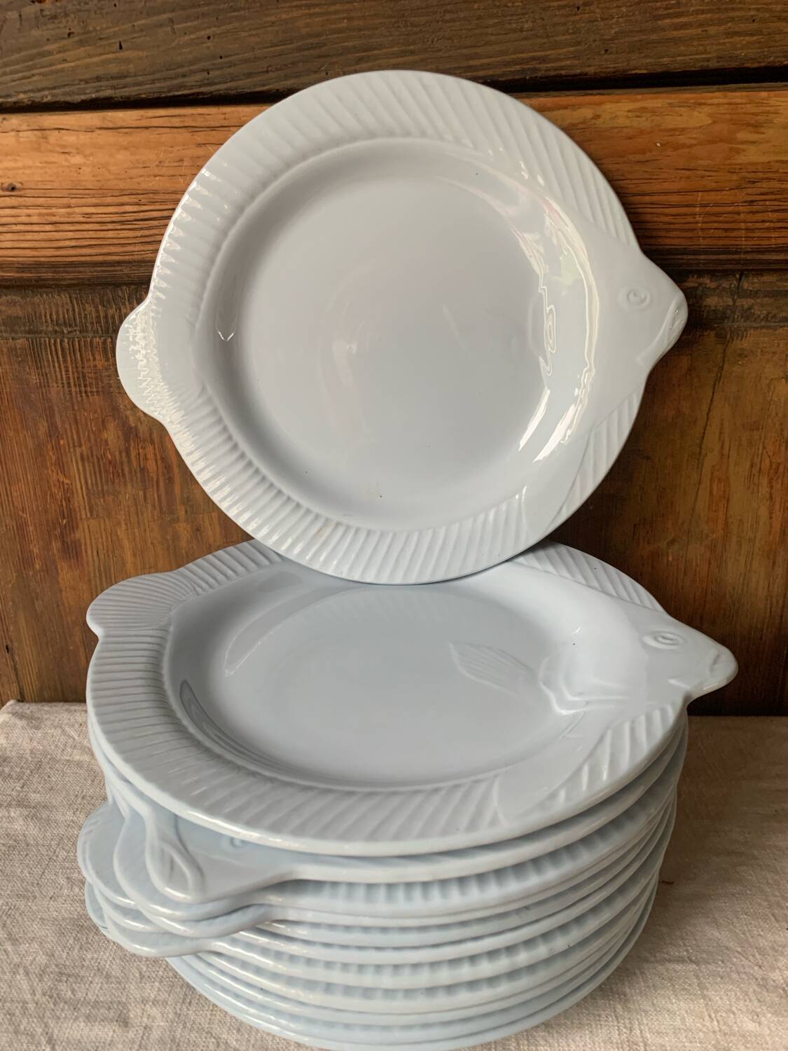 12 blue fish plates, Sarreguemines, 1930s