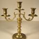 Three-light candlestick in gilded bronze