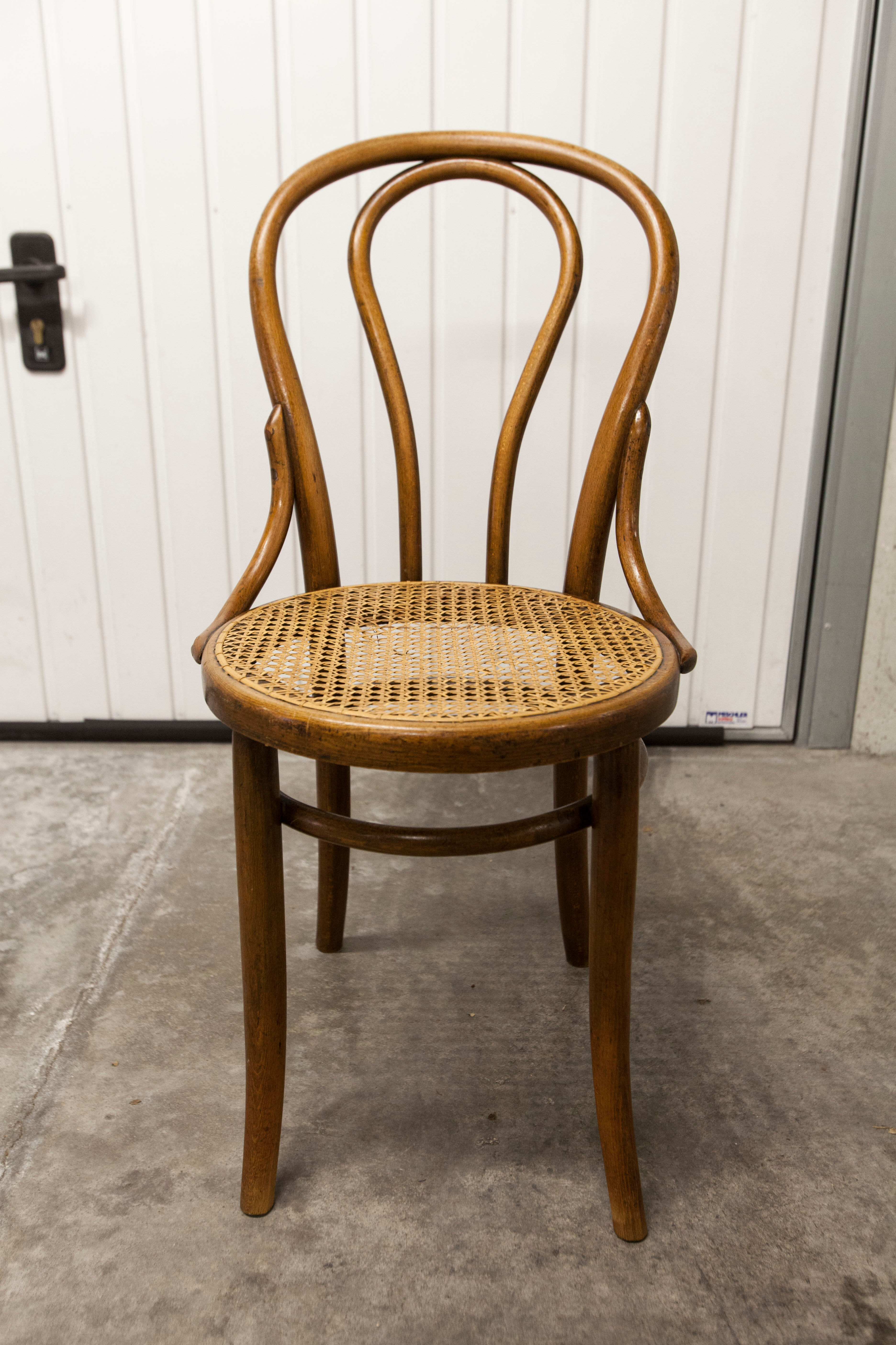 Curved wooden chair manual canning 1900