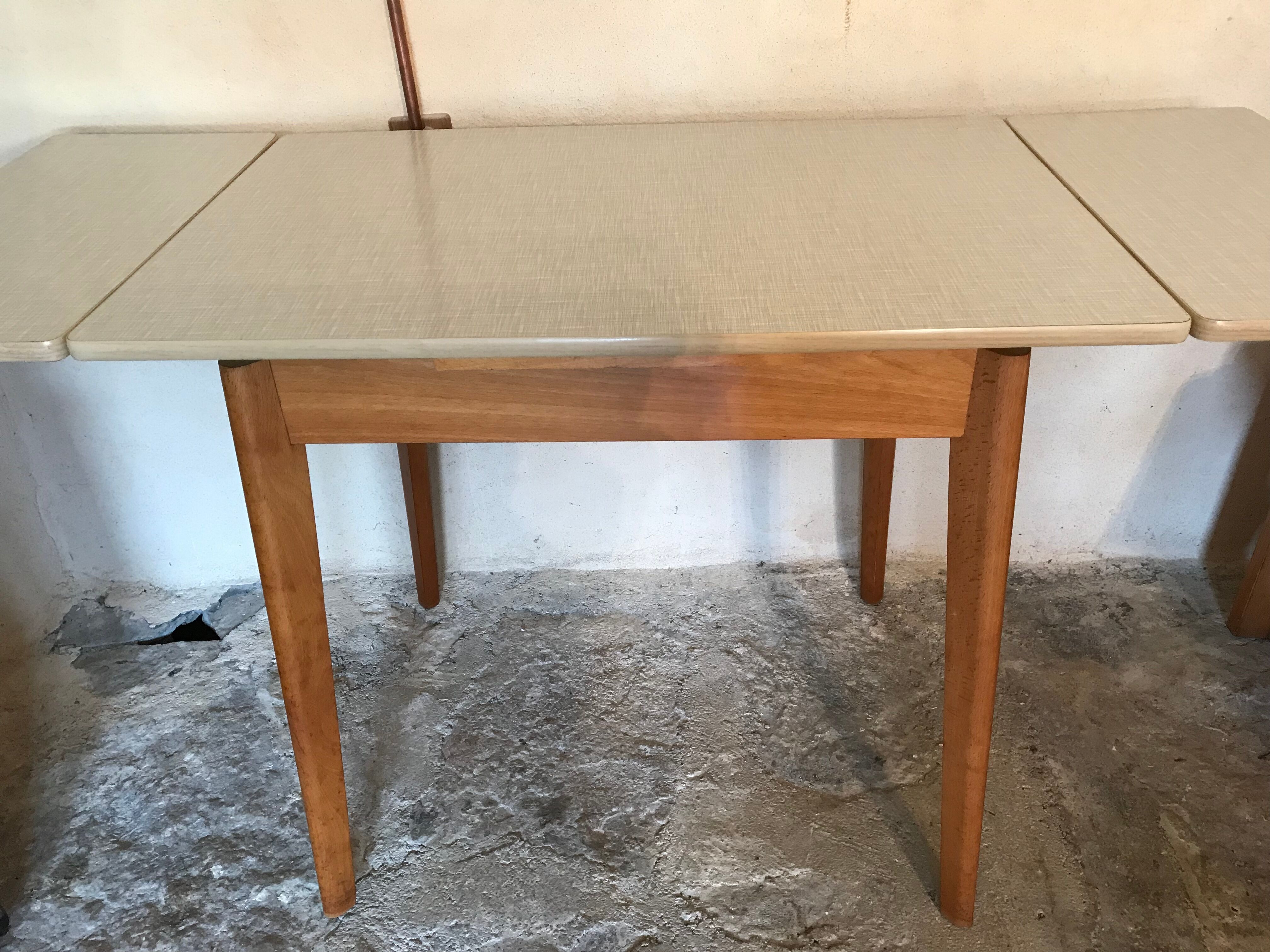 Kitchen table 1960's with extensions, formica and base wood compass