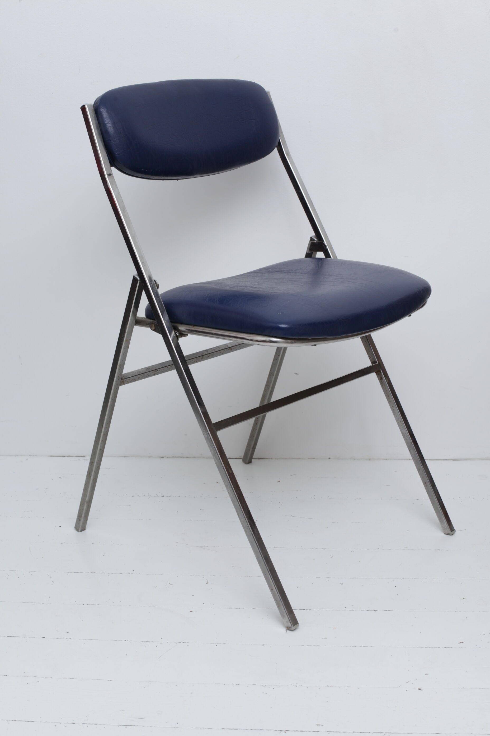 Folding blue skaï chair - chrome legs