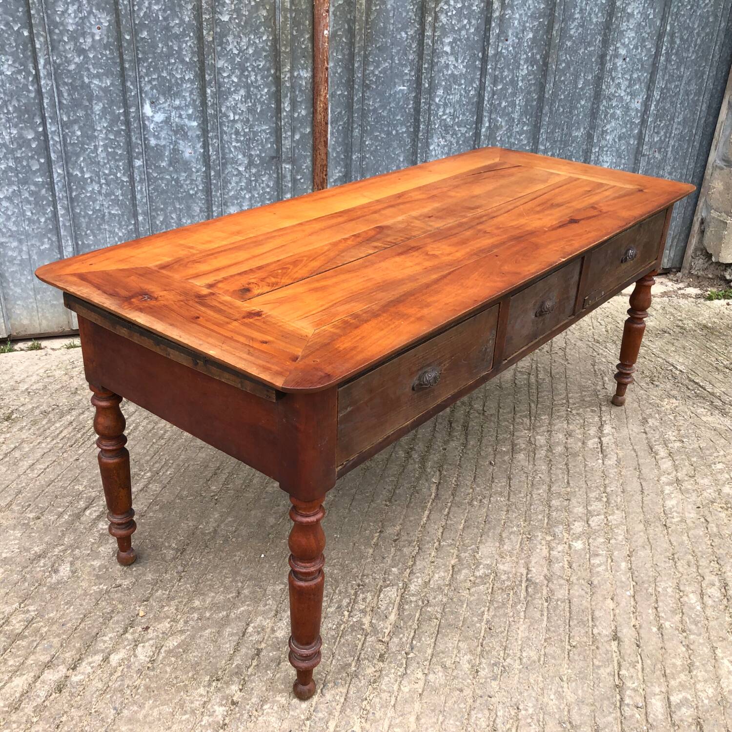 Antique Louis Philippe table in solid cherry and oak with 3 drawers